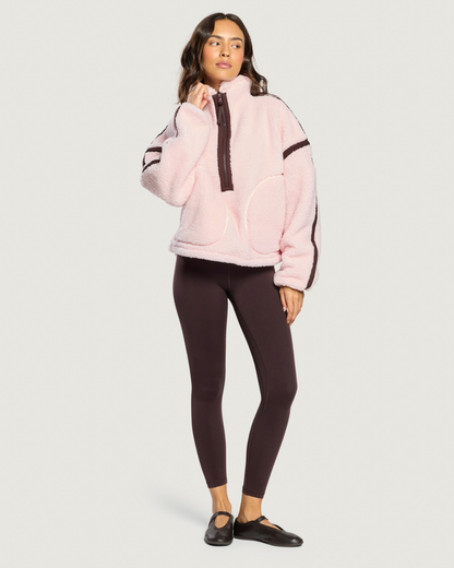 Gym+Coffee Industry Fleece Half Zip Ballet Pink worn by woman Shop Gym+Coffee at Dotique