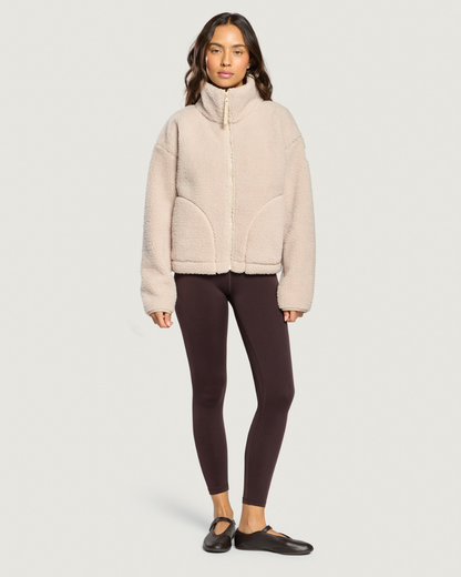 Model wearing Gym+Coffee Industry Fleece High Collar Jacket Natural Shop Gym+Coffee at Dotique