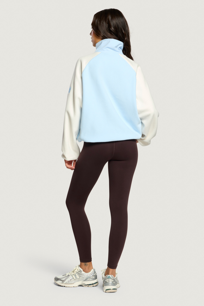 Back view of model wearing Gym+Coffee Snap Polar Fleece Glacial Blue Shop Gym+Coffee at Dotique