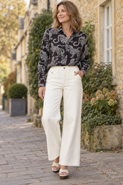 Woman wearing Milano 63-6568-3655 Leopard Print Shirt Blouse by MILANO Shop MILANO at Dotique